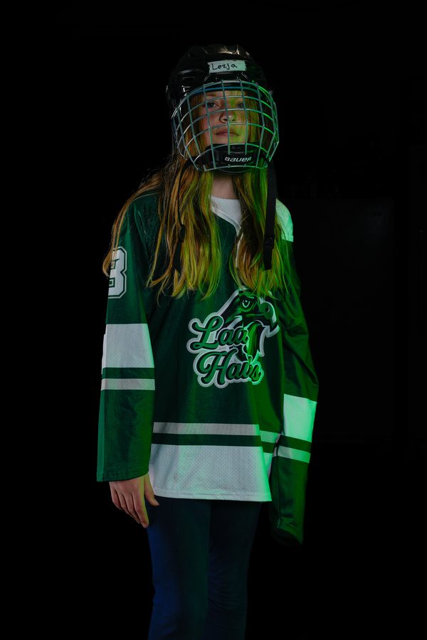 Studio portrait of a youth hockey player